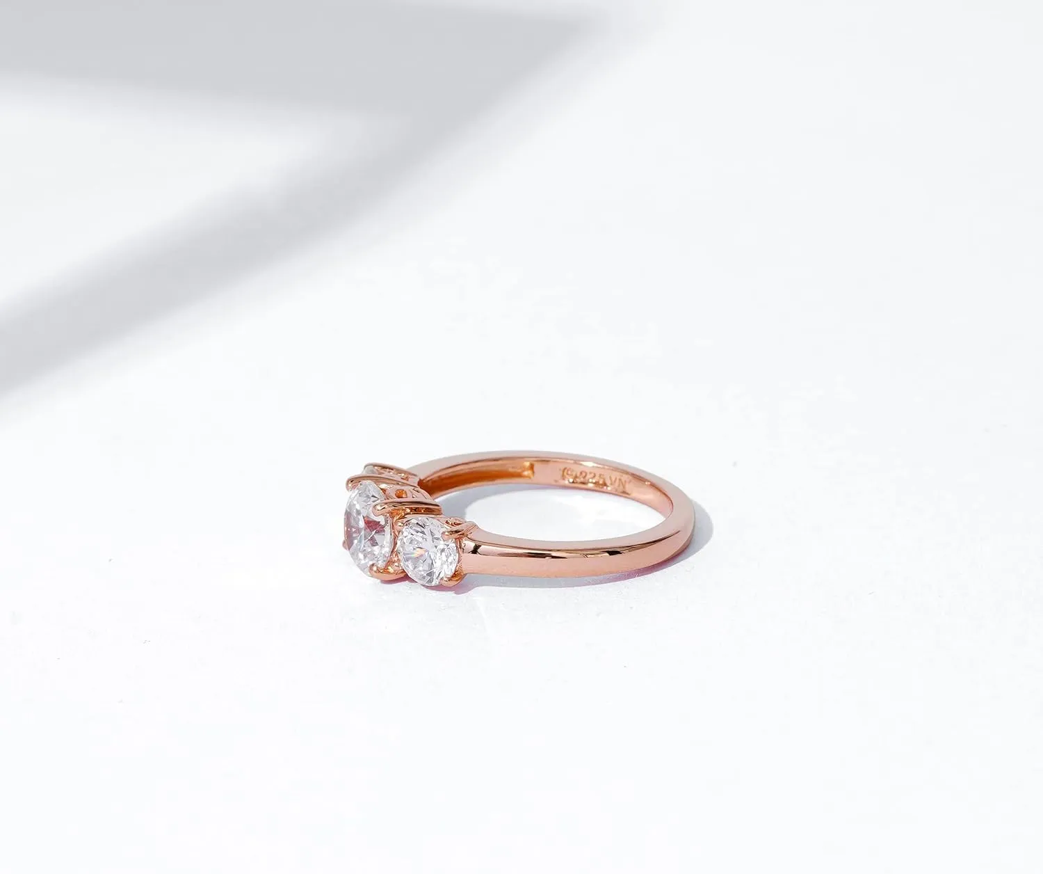 Amazon Essentials Platinum or Gold Plated Sterling Silver Round 3-Stone Ring made with Infinite Elements Cubic Zirconia (previously Amazon Collection)