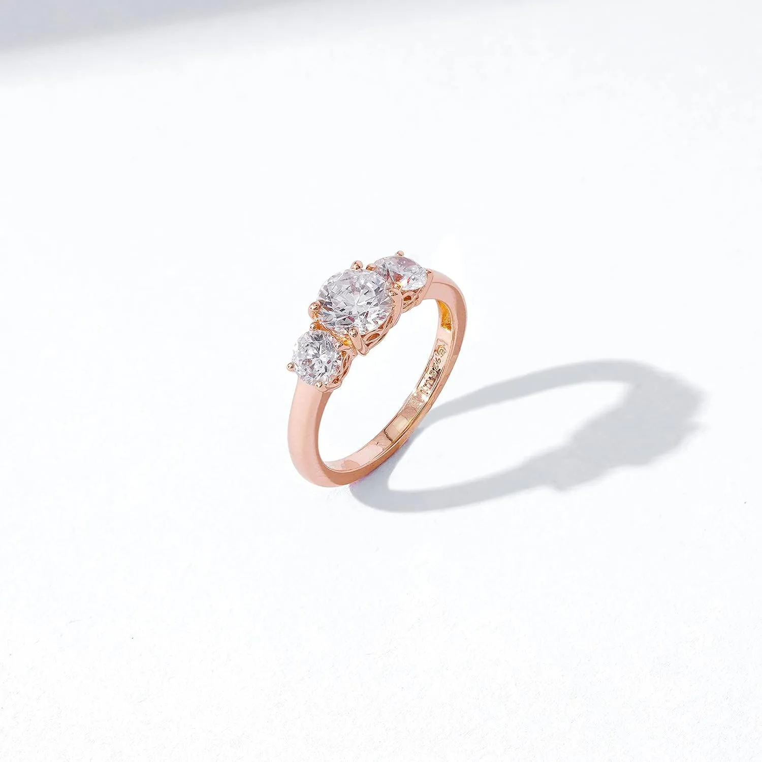 Amazon Essentials Platinum or Gold Plated Sterling Silver Round 3-Stone Ring made with Infinite Elements Cubic Zirconia (previously Amazon Collection)