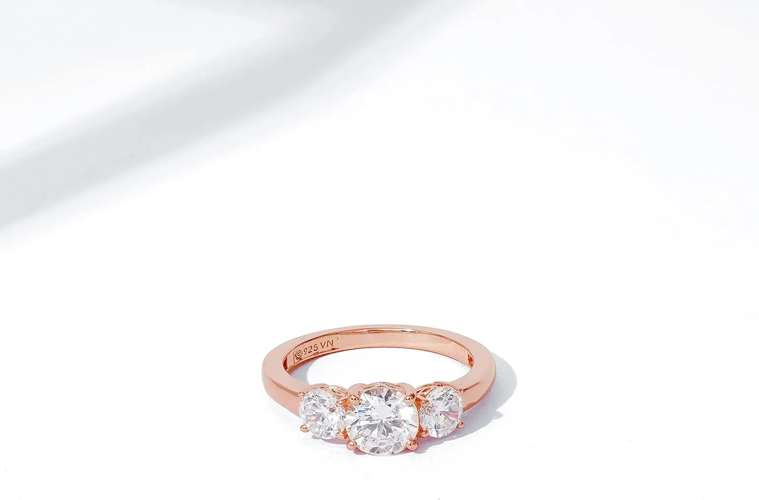 Amazon Essentials Platinum or Gold Plated Sterling Silver Round 3-Stone Ring made with Infinite Elements Cubic Zirconia (previously Amazon Collection)