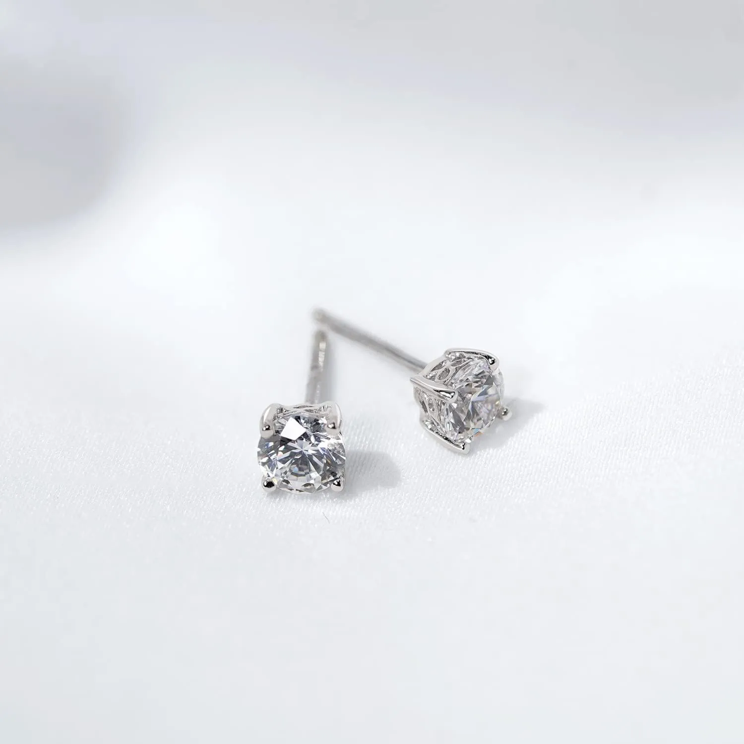 Amazon Essentials Yellow Gold Plated, Platinum or Rose Gold Plated Sterling Silver Infinite Elements Cubic Zirconia Stud Earrings | White, Blue, Green, or Pink Cubic Zirconia (previously Amazon Collection)